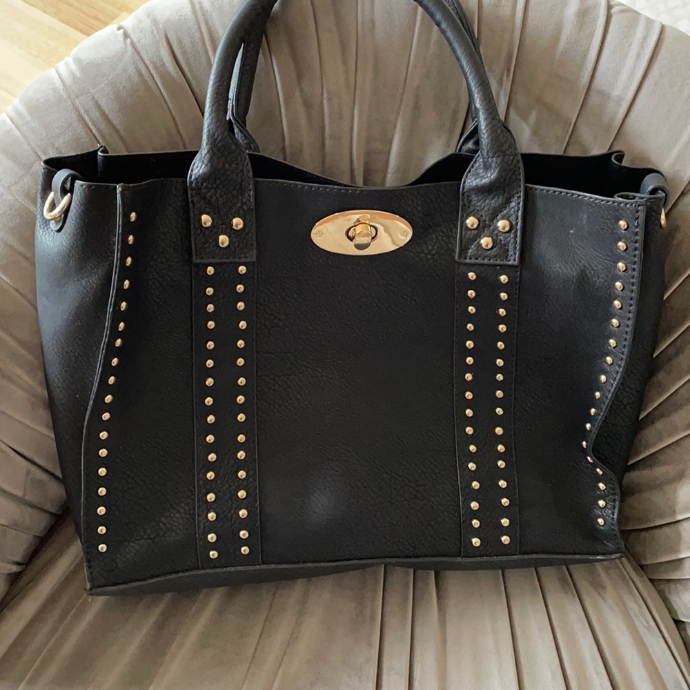 Black and gold studded bag